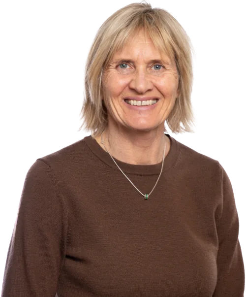 catherine-syme Catherine Syme smiling to camera wearing brown top